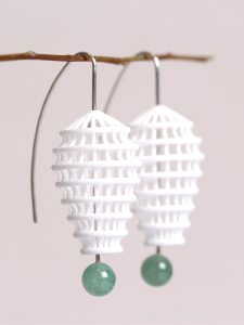 large but lightweight dangle earrings made of 3D printed net- the hooks are made of sterling silver with green agate beats at one end. designed by XbyAB jewelry design