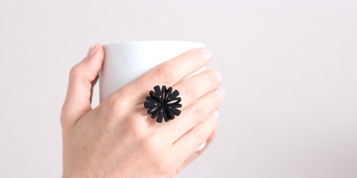 black elegant floral ring